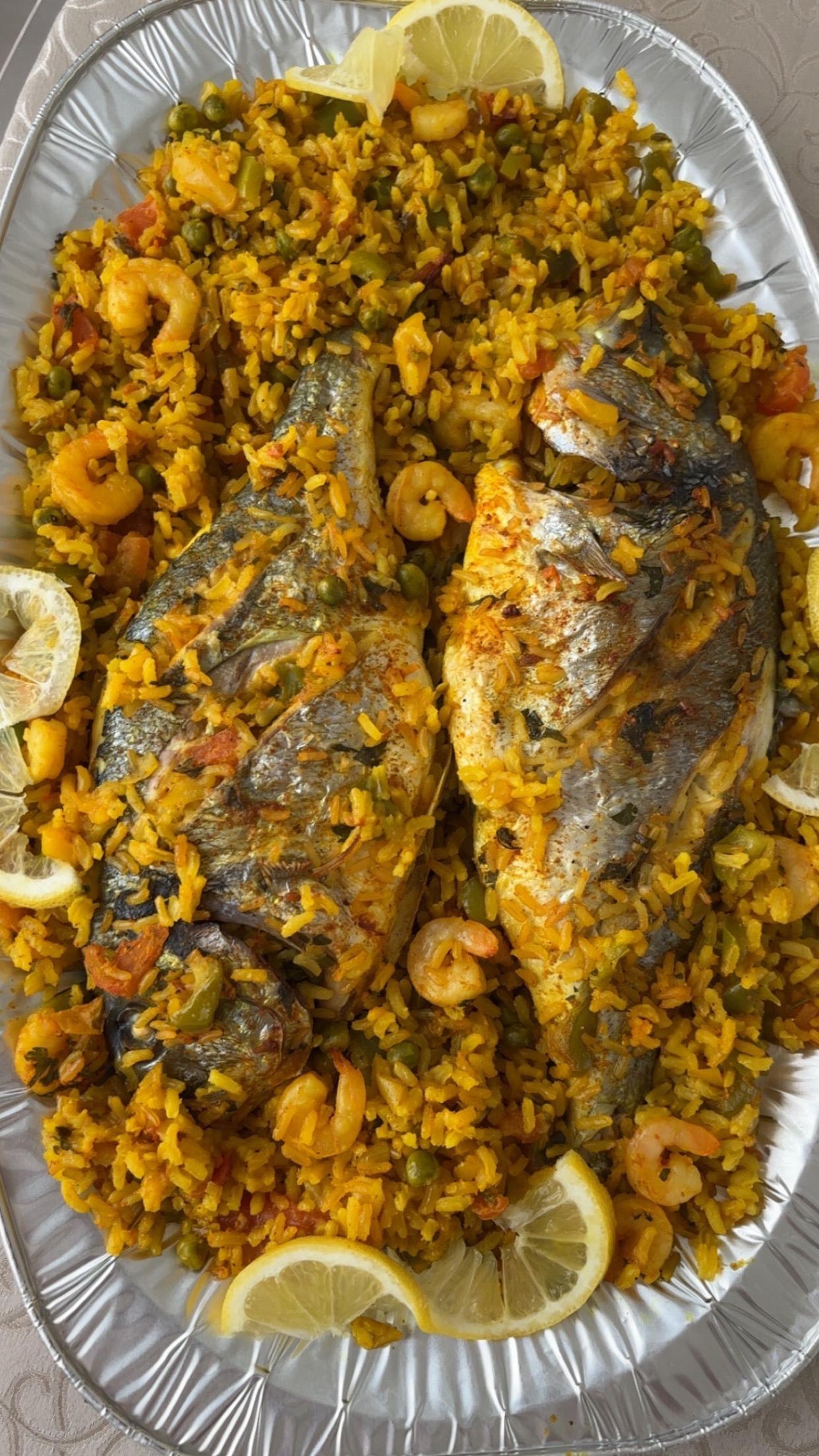 Dorades uit de oven met garnalen en rijst