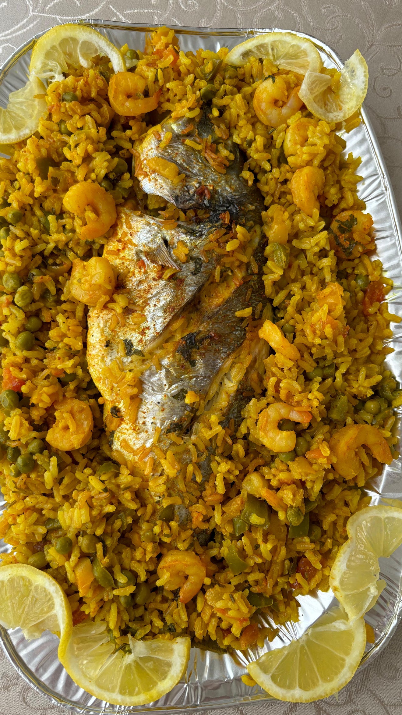 Dorades uit de oven met garnalen en rijst