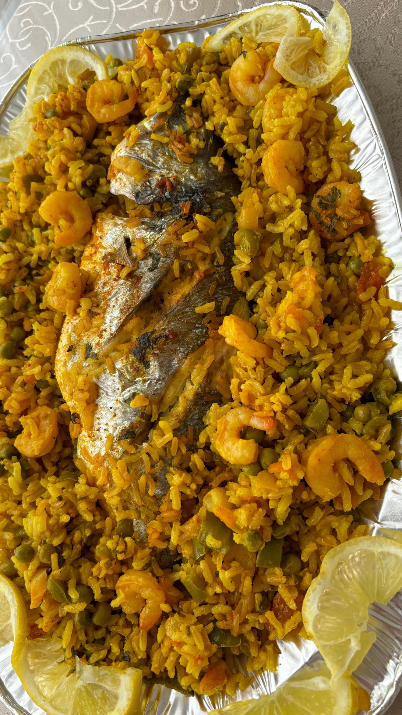 Dorades uit de oven met garnalen en rijst